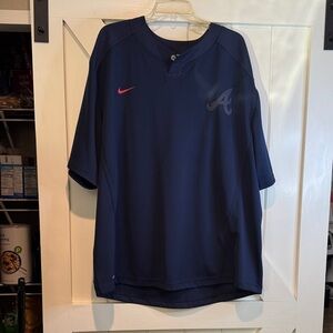 Nike Men's Navy Blue Atlanta Braves Jersey with Pink Swoosh